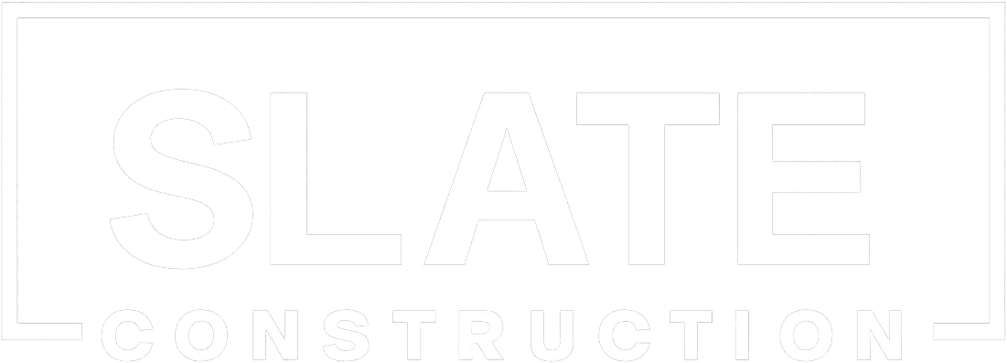 White logo with the word "SLATE" in large bold letters above the word "CONSTRUCTION," all inside a thin rectangular border on a light background.